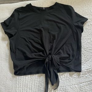 Lululemon athletica black cropped shirt. Size 4